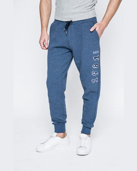 Pantaloni Guess bleumarin